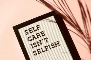 Sign stating, "Self-care isn't selfish."